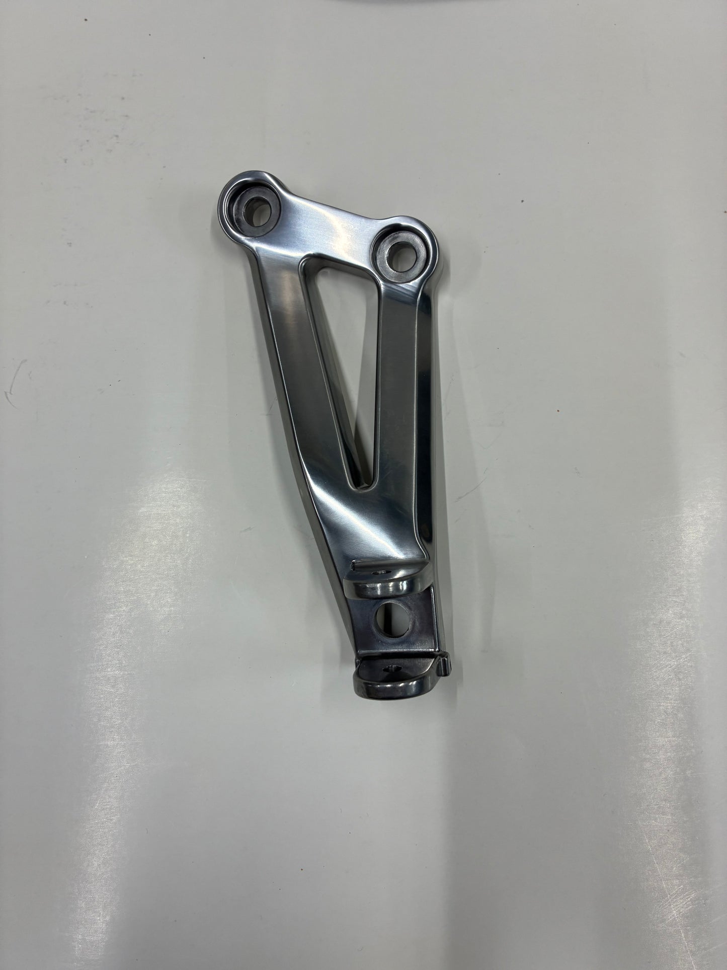 Kawasaki NOS 2000 - 2003 ZX-12R Ninja left rear peg support bracket 35063-1064