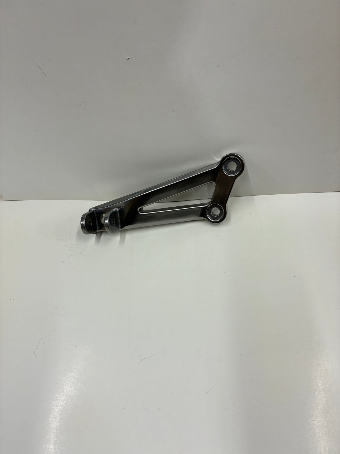 Kawasaki NOS 2000 - 2003 ZX-12R Ninja left rear peg support bracket 35063-1064